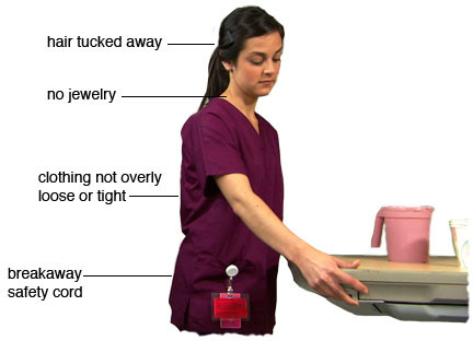 Nurse dressed for safety: hair tucked away, no jewelry, clothing not overly loose or tight, breakaway safety cord